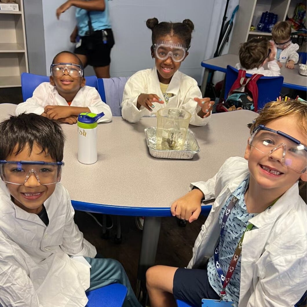 young students participating in science experiment